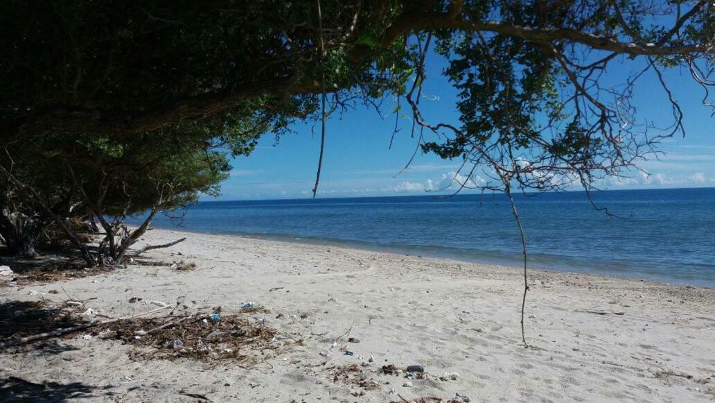 Wera Beach Kadumbul Buitenkant foto